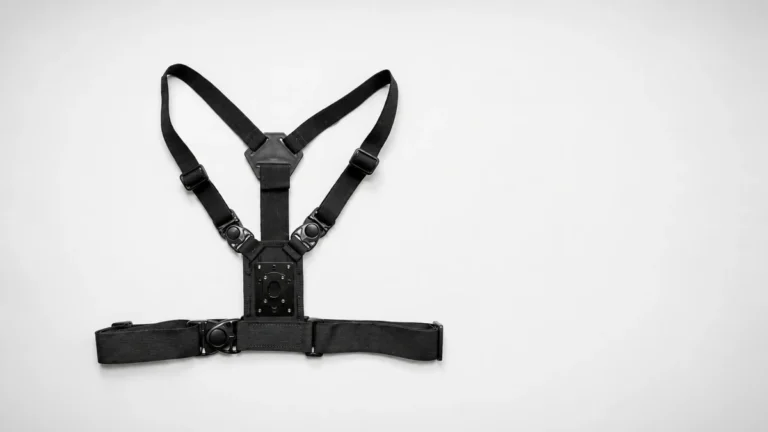 Four-point body camera chest harness with adjustable shoulder and waist straps