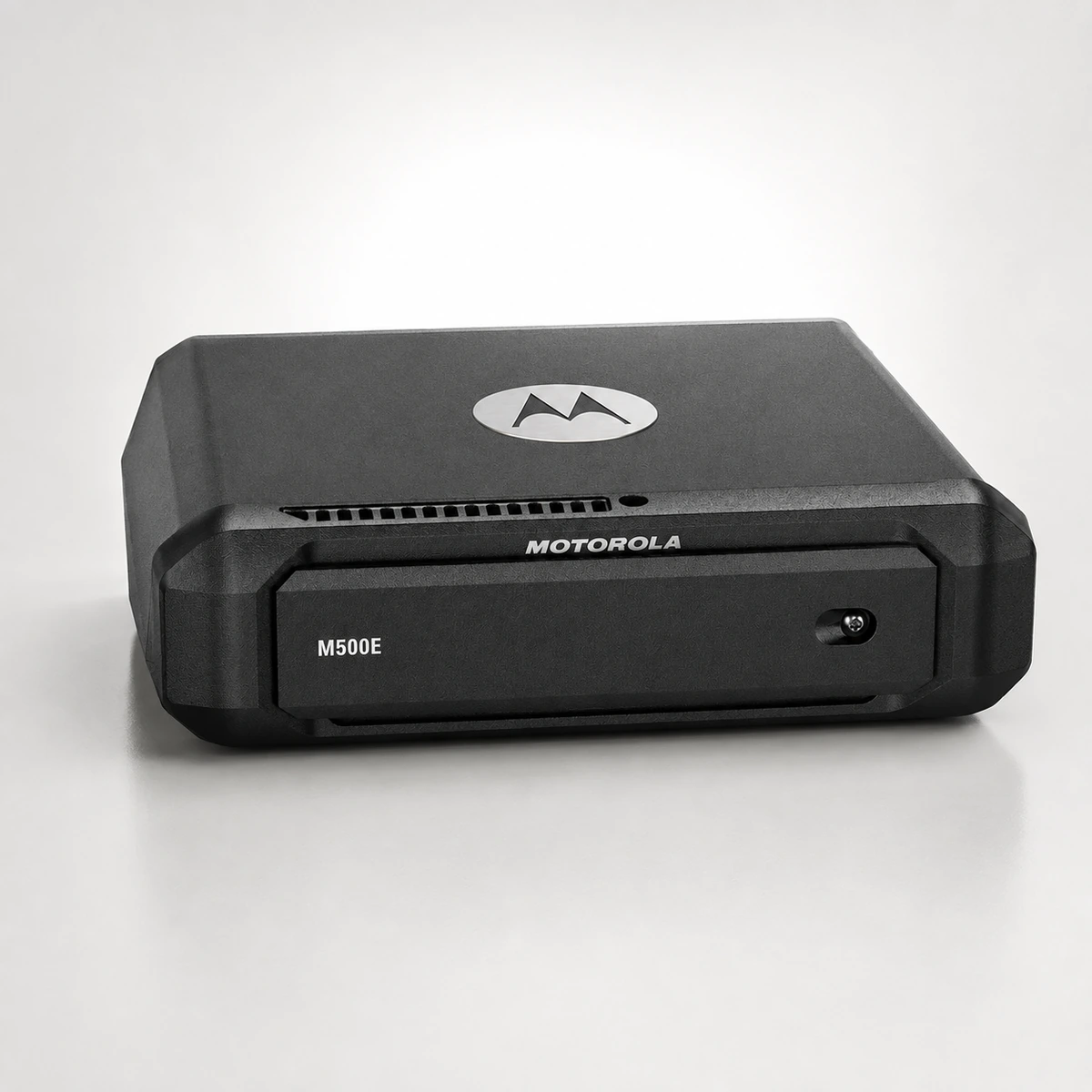 Motorola M500E core processor, a single DIN unit with the Motorola logo on the lid, a ventilation slot and the memory card bay across the front