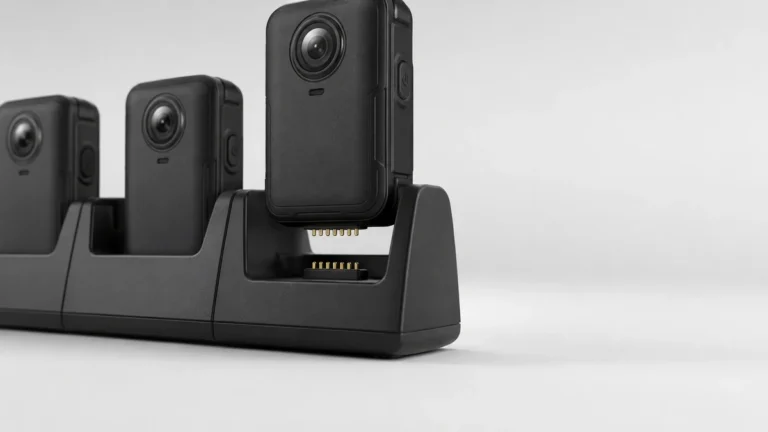 Body cameras seated in a multi-bay docking station