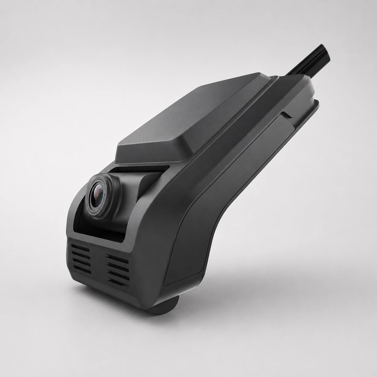 Xignal M606 dash camera from the opposite side, showing the road facing lens recessed in its housing and the windscreen mounting arm